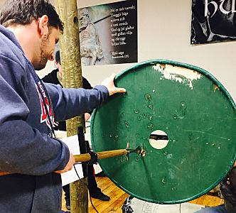 Viking plied shield pierced many times by spear