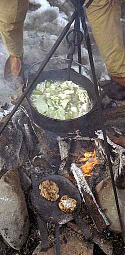 cauldron and pan in fire
